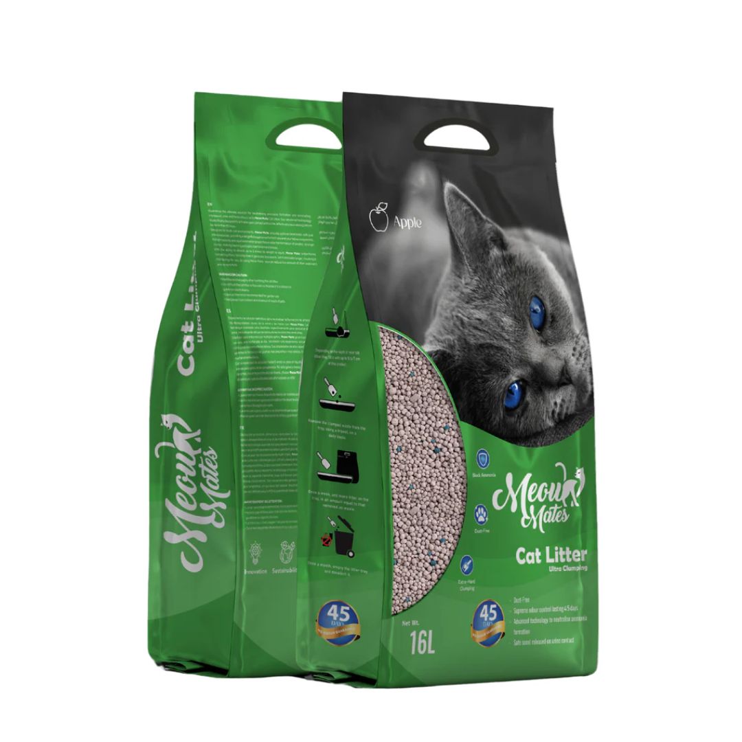 Two green bags of cat litter with a cat's face on one bag, on a white background.