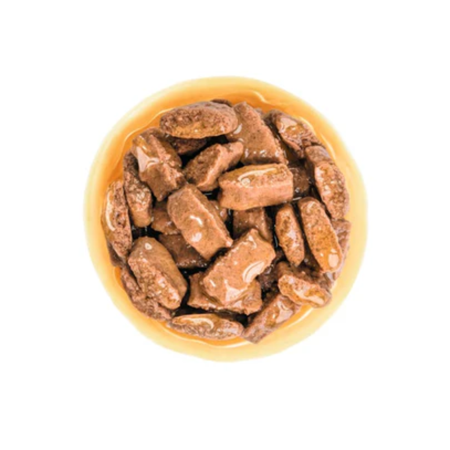 Yellow bowl filled with brown candy pieces on a white background