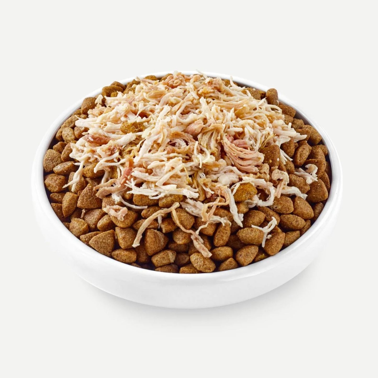 White bowl filled with pet food and shredded cheese on a white background