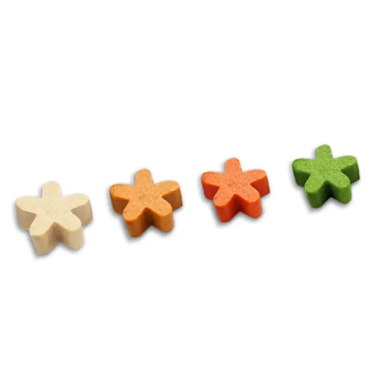 Set of four colorful star-shaped blocks on a white background