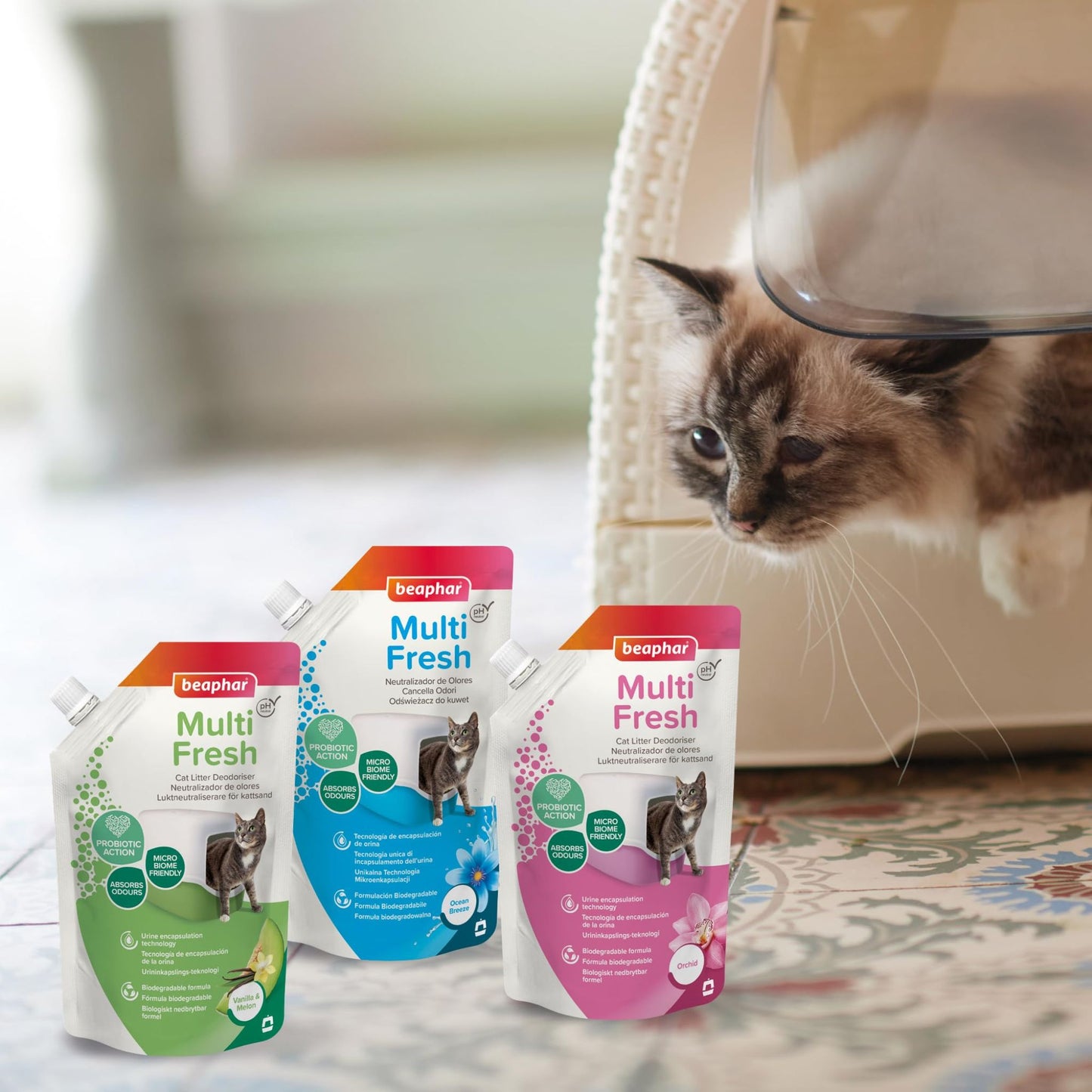 Three packages of Beaphar Multi Fresh catnip product with a cat in the background.