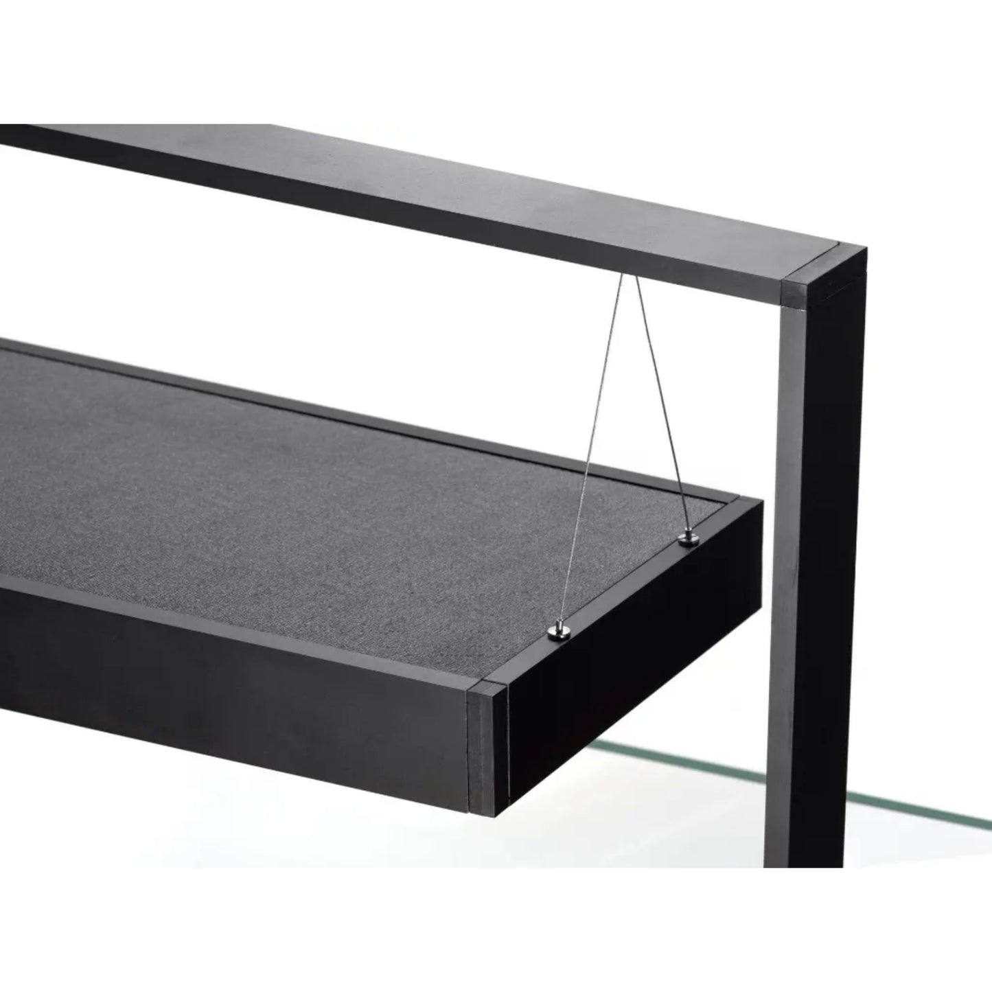 Black metal shelf with a glass panel on a white background