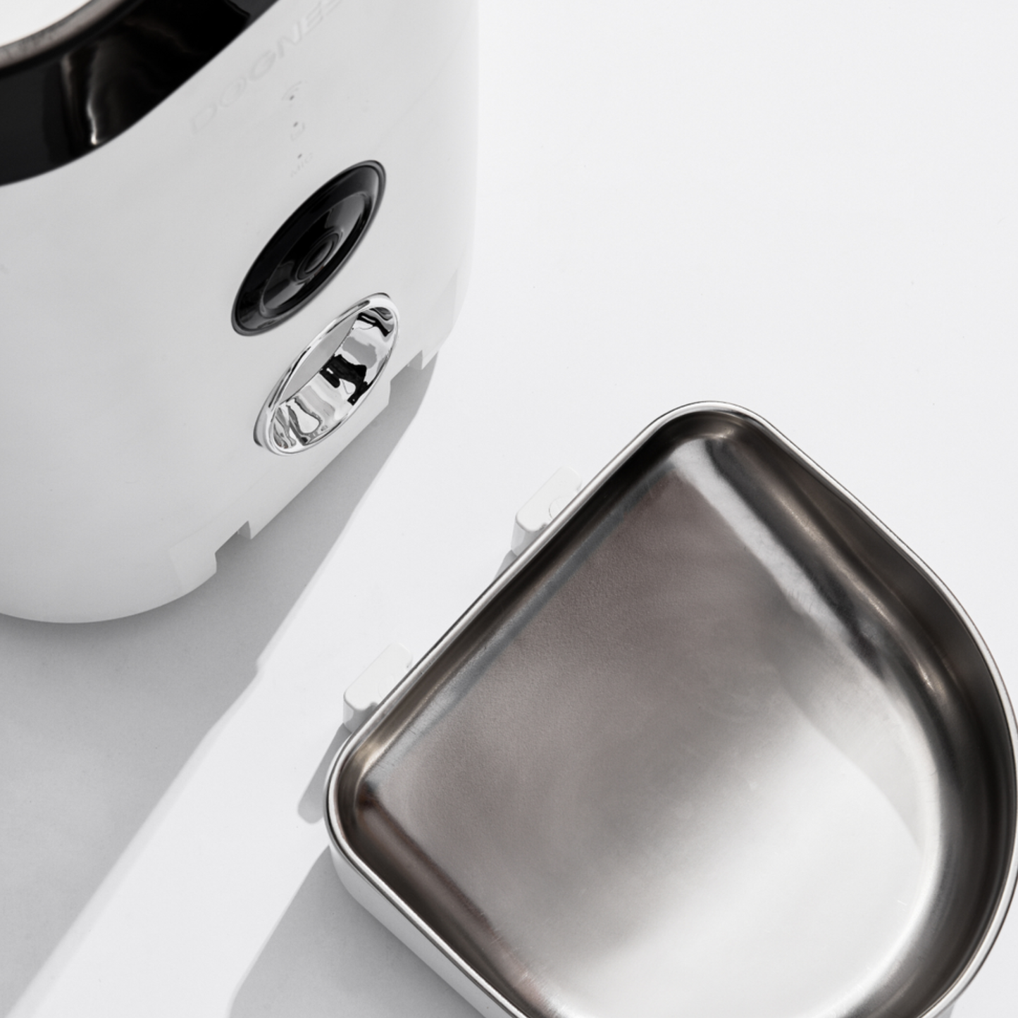 Metallic container on a white surface