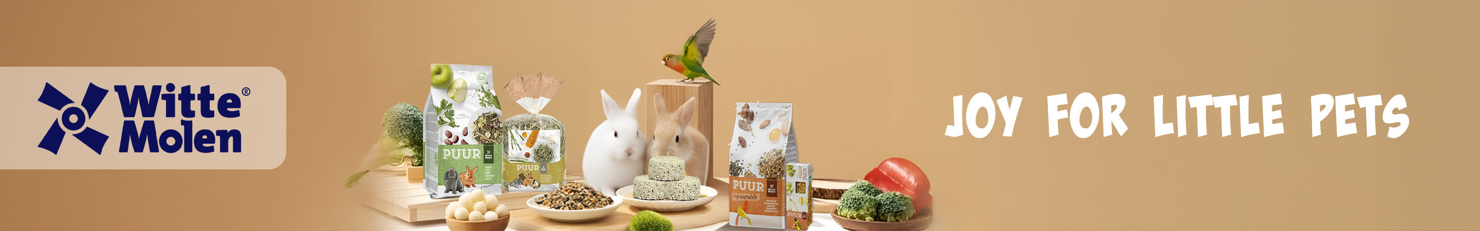 "Witte Molen pet food products for small pets, featuring rabbit and bird food, including pellets, herbs, and fresh vegetables, with a rabbit, bird, and colorful packaging."