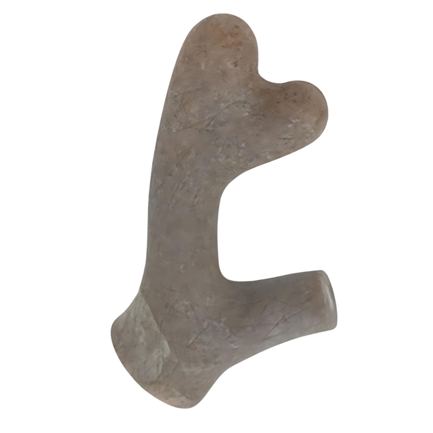 Decorative stone heart-shaped object on a white background