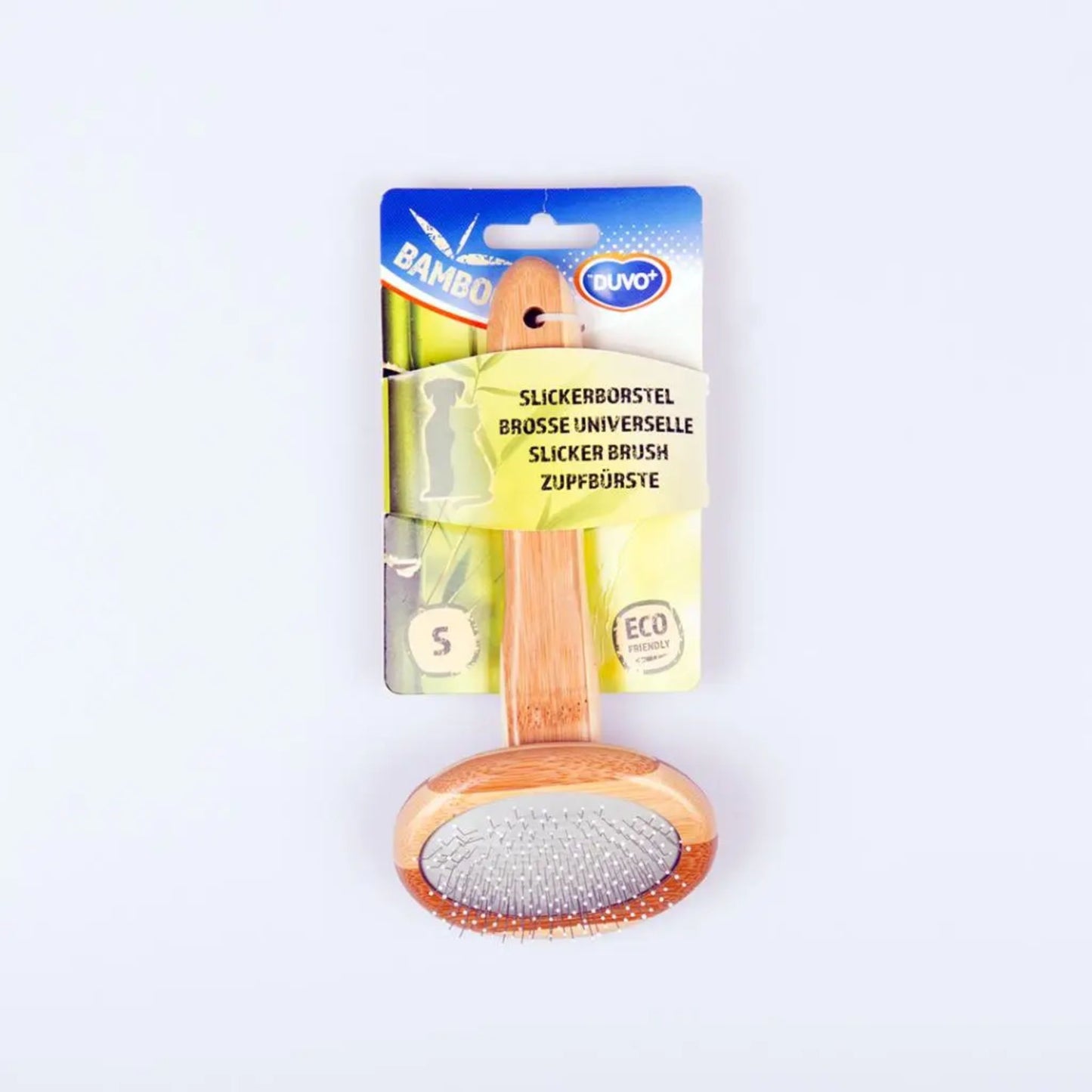 S Dog grooming brush with packaging on a white background
